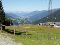 Blick zurück auf die Sattelalm und das Alpenpanorama : MTB, Transalp, Transalp 2003